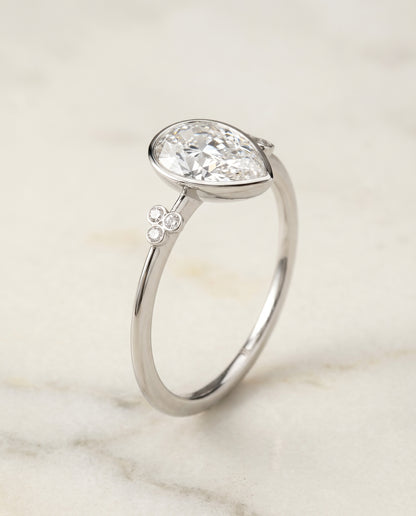 The Selena Clover Bezel Accent Solitaire Princess Cut Engagement Ring Setting in 18K White Gold