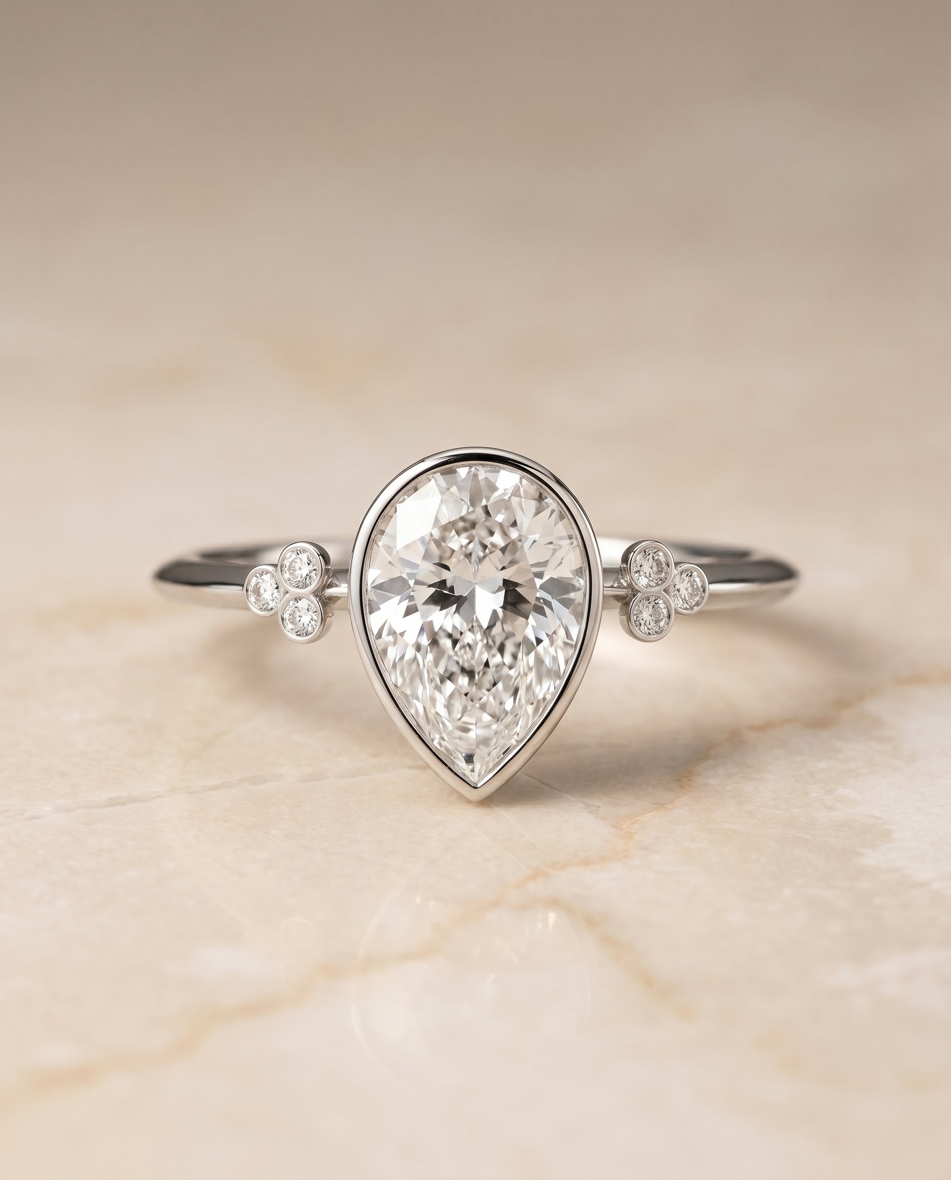 The Selena Clover Bezel Accent Solitaire Princess Cut Engagement Ring Setting in 18K White Gold