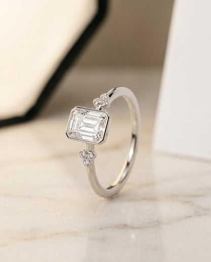 Selena Select Clover Bezel Accent Solitaire Radiant Cut Lab Diamond Engagement Ring in Platinum, front view | RockHer