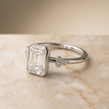 The Selena Clover Bezel Accent Solitaire Radiant Cut Engagement Ring Setting in Platinum
