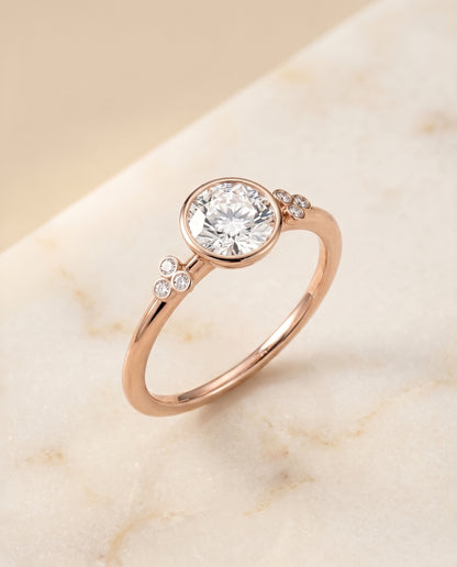 The Selena Clover Bezel Accent Solitaire Round Engagement Ring Setting in 14K Rose Gold