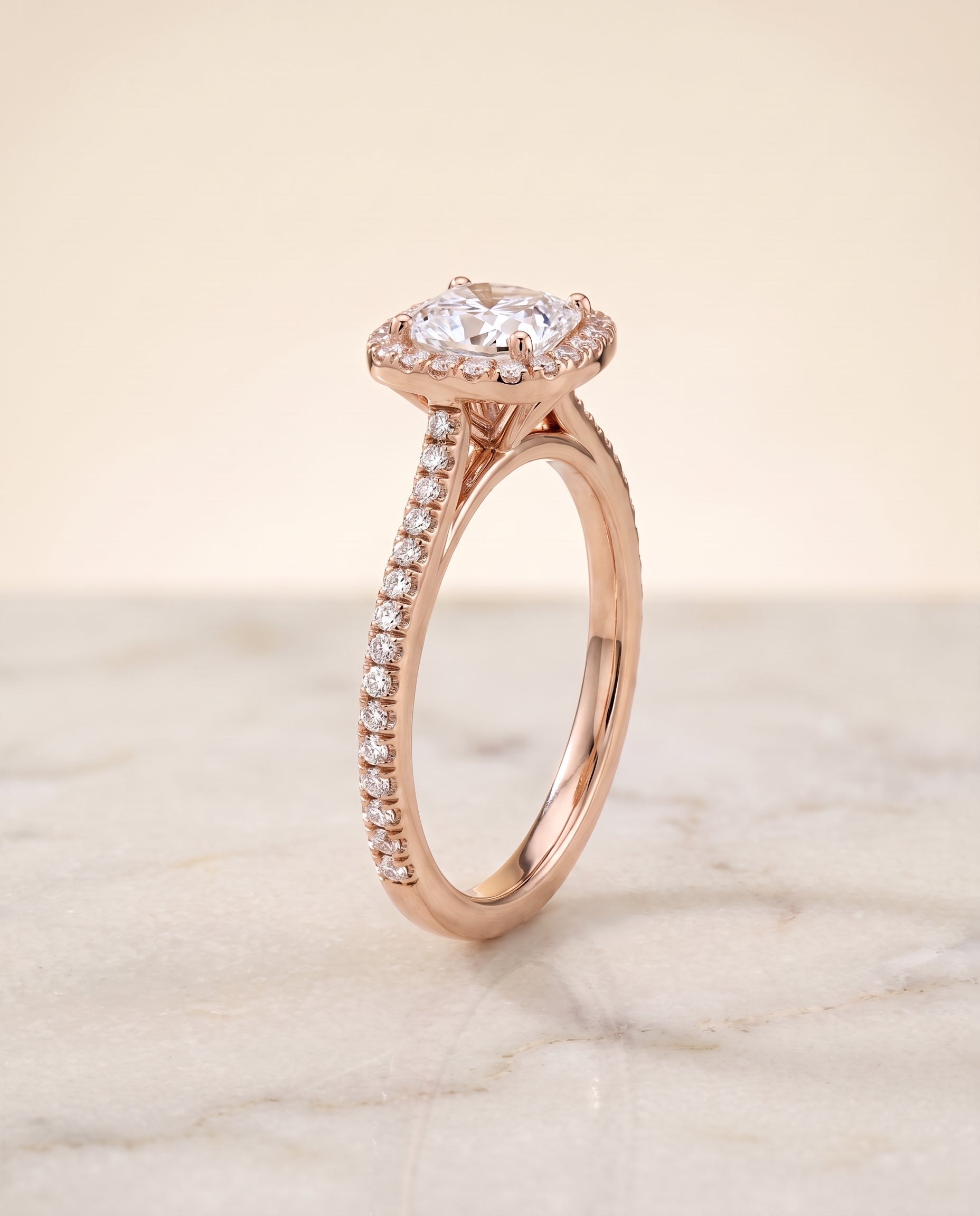 Graduated Shank Pavé Halo Cut styling on The Sonata cushion engagement ring setting | RockHer