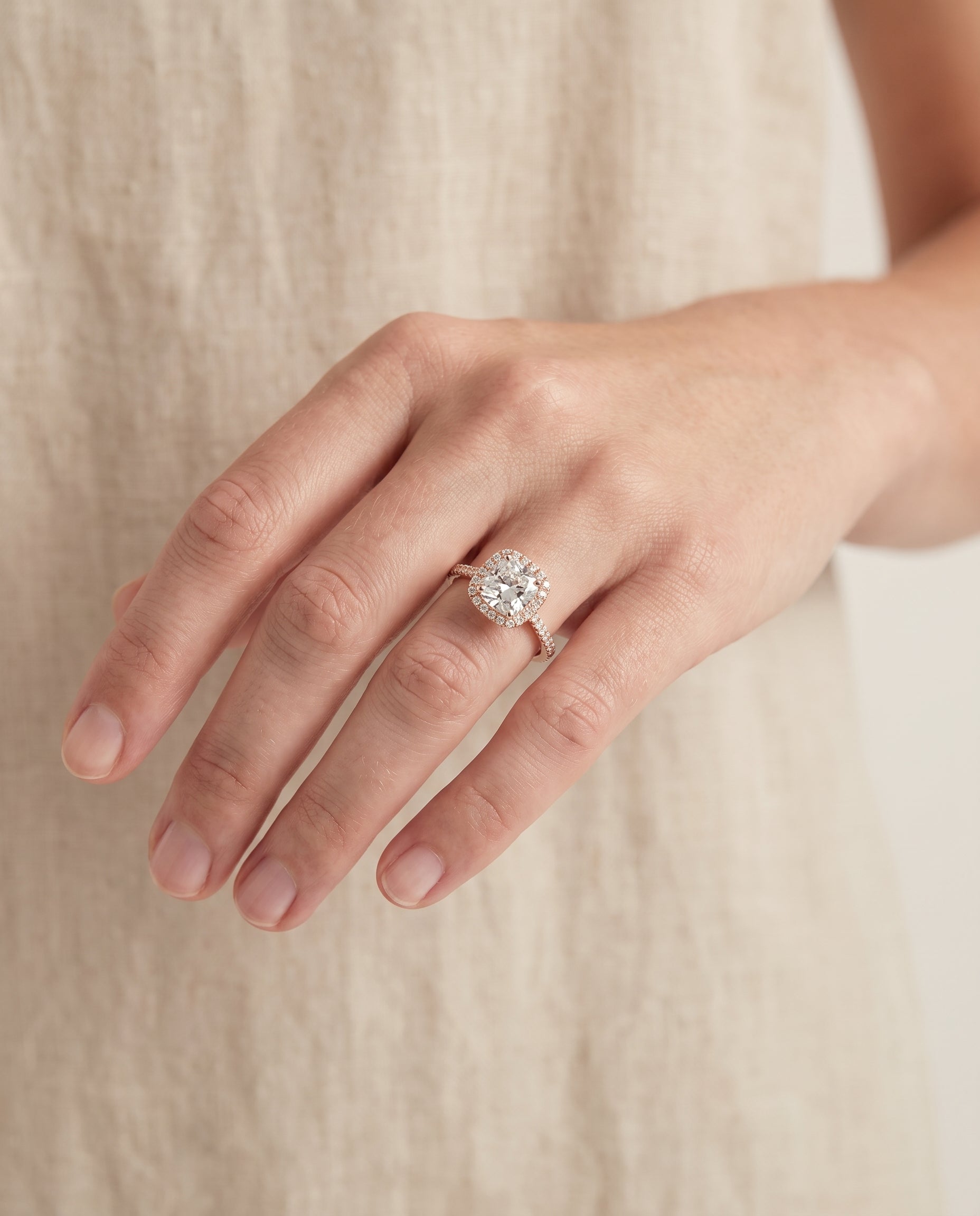 The Sonata engagement ring setting in 14K Rose Gold, graduated shank pavé halo cut design | RockHer