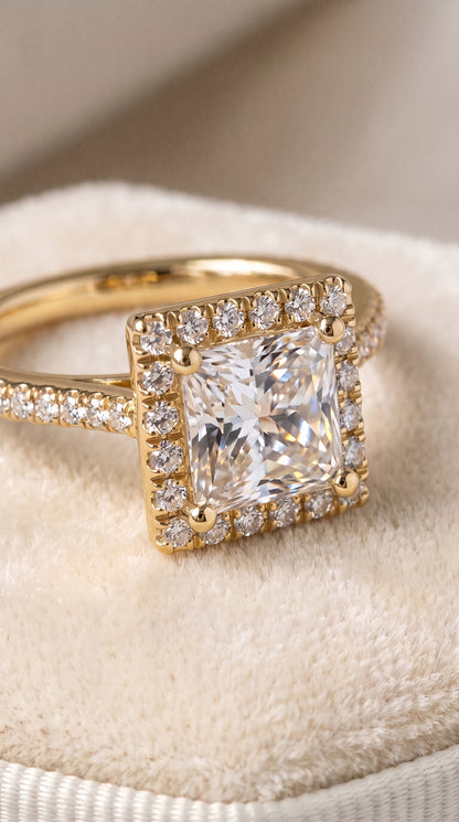 The Sonata Graduated Shank Pavé Halo Princess Cut Engagement Ring Setting in 18K Yellow Gold