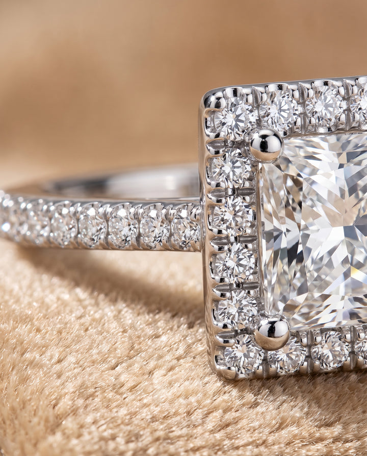 The Sonata Graduated Shank Pavé Halo Princess Cut Engagement Ring Setting in Platinum