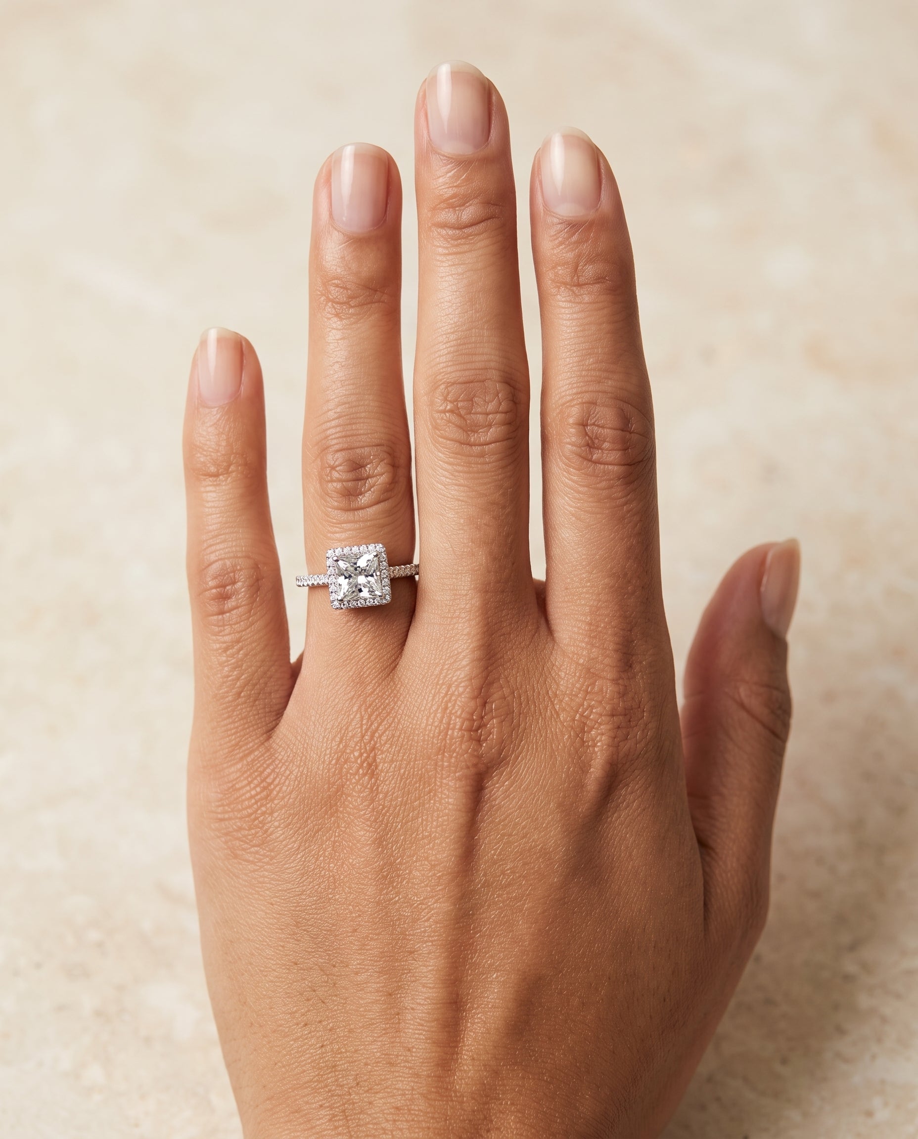 The Sonata engagement ring setting in Platinum, graduated shank pavé halo design | RockHer