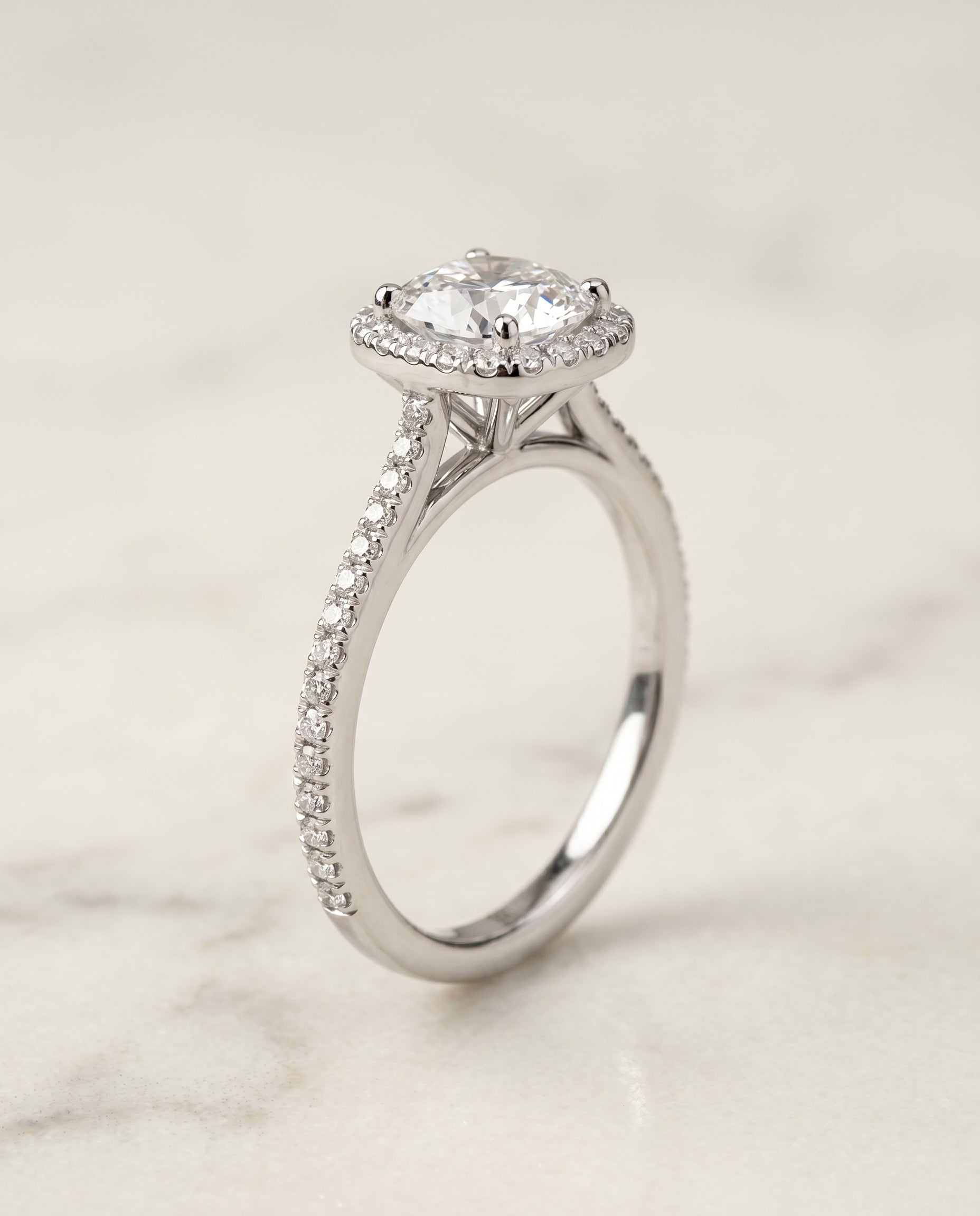 Graduated Shank Pavé Halo Cut styling on The Sonata cushion engagement ring setting | RockHer