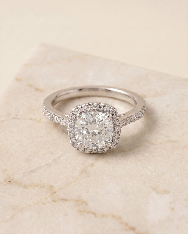 The Sonata Select Graduated Shank Pavé Halo Cushion Cut Lab Diamond Engagement Ring in Platinum