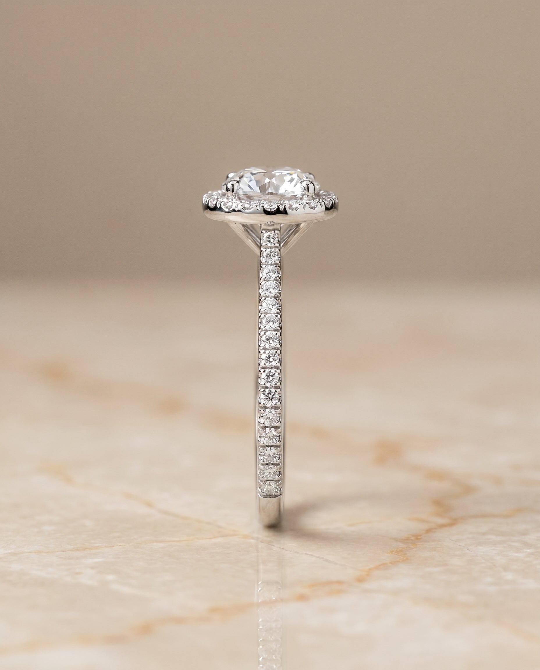 Graduated Shank Pavé Halo styling on The Sonata round engagement ring setting | RockHer