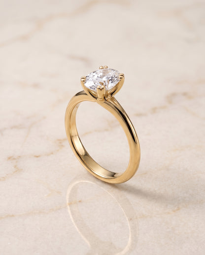 The Spring East West Eight Claw Comfort Fit Solitaire Oval Engagement Ring Setting in 18K Yellow Gold
