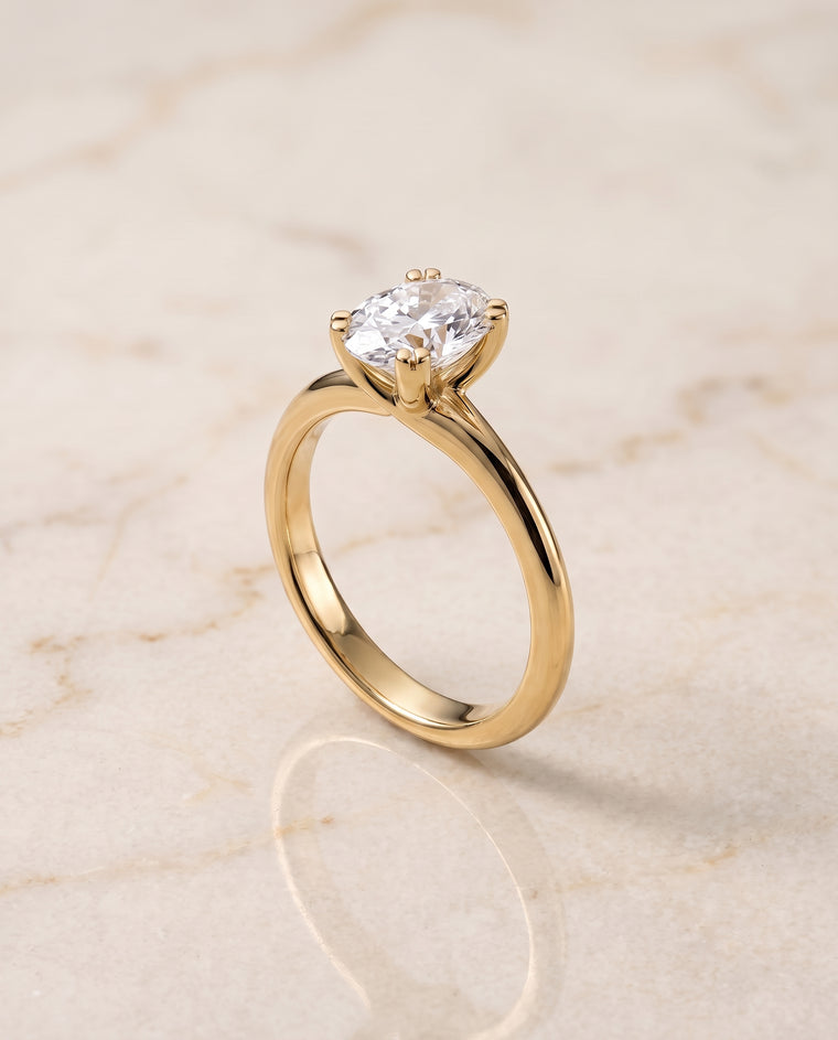 The Spring East West Eight Claw Comfort Fit Solitaire Oval Engagement Ring Setting in 18K Yellow Gold