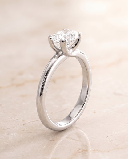 The Spring East West Eight Claw Comfort Fit Solitaire Oval Engagement Ring Setting in 18K White Gold
