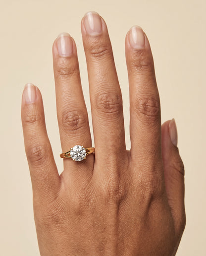 The Spring East West Eight Claw Comfort Fit Solitaire Round Engagement Ring Setting in 18K Yellow Gold