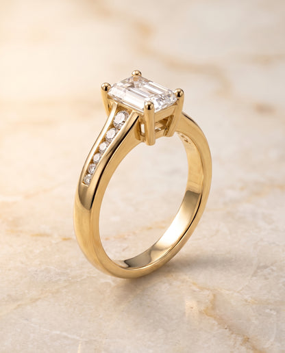 The Stevie Contemporary Channel Emerald Cut Engagement Ring Setting in 18K Yellow Gold