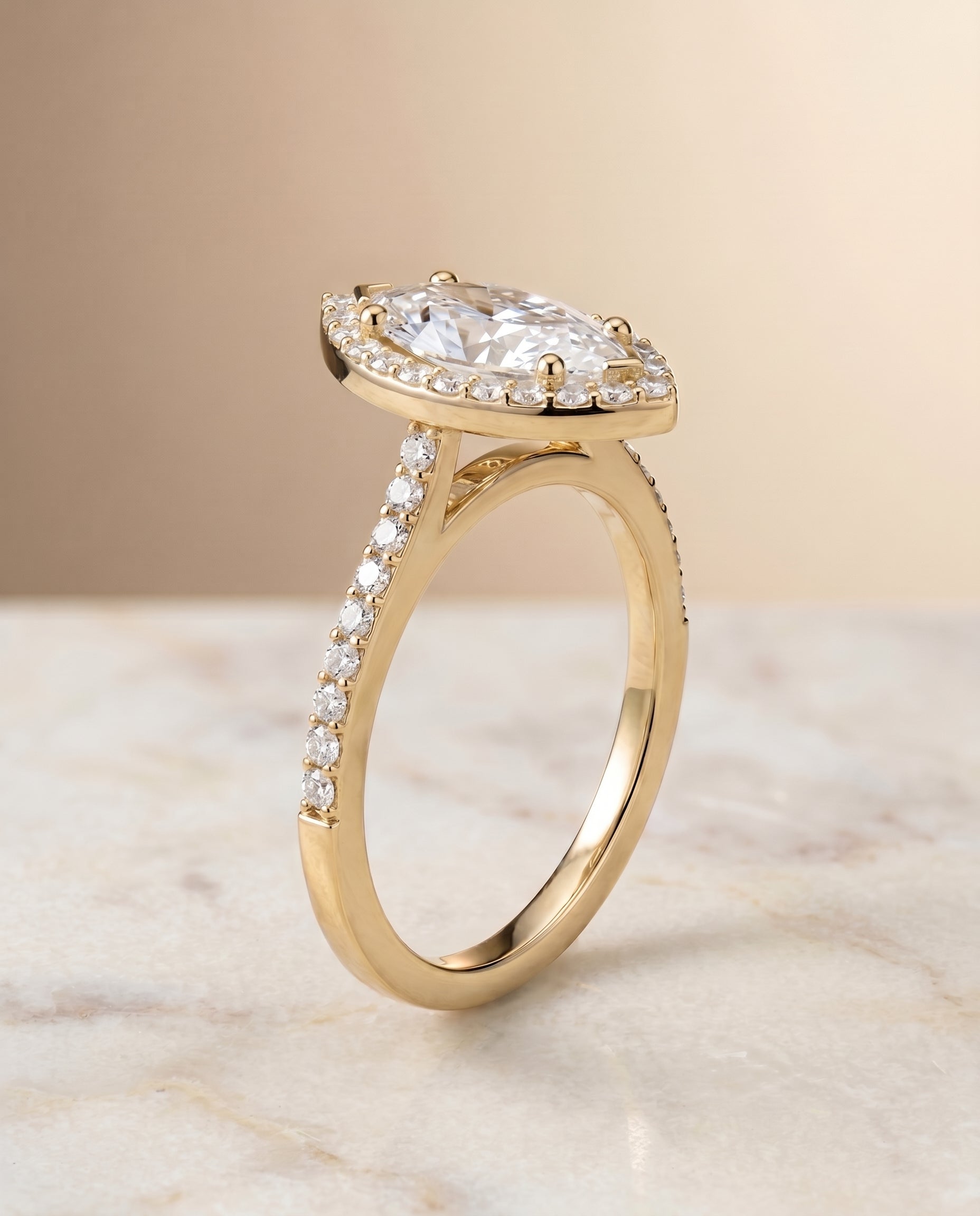 Pavé Halo styling on The Taylor marquise engagement ring setting | RockHer