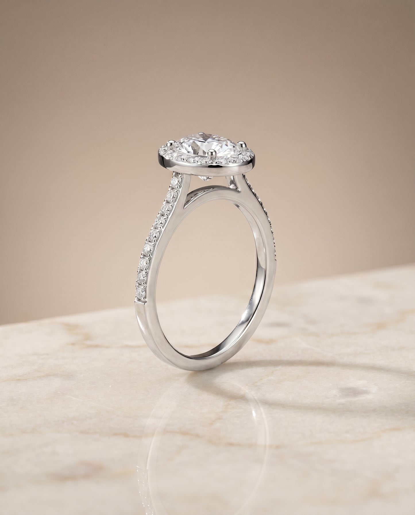 The Taylor Pavé Halo Engagement Ring Setting for Oval Diamonds in 18K White Gold