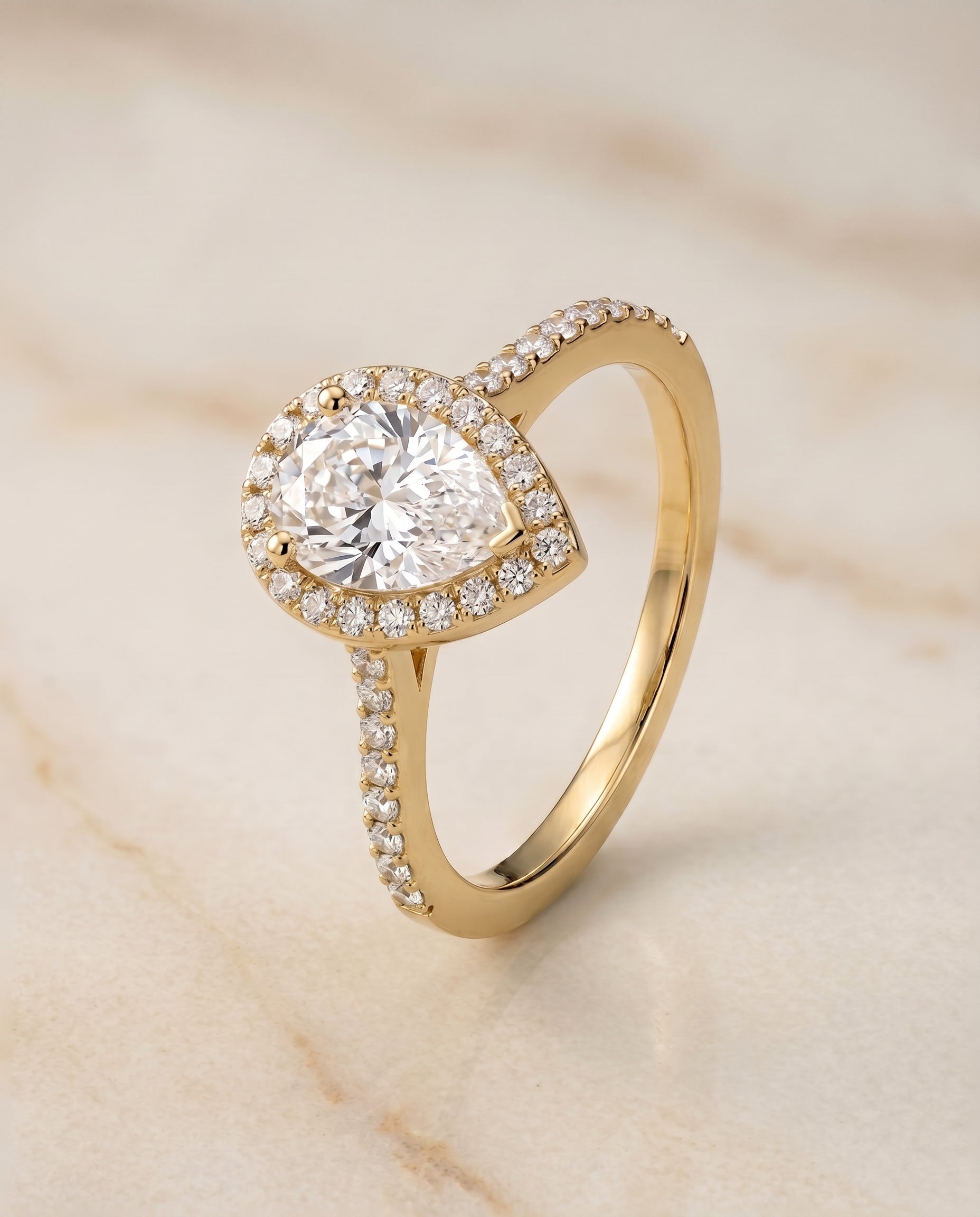 The Taylor setting for pear diamonds, made to order in 18K Yellow Gold | RockHer