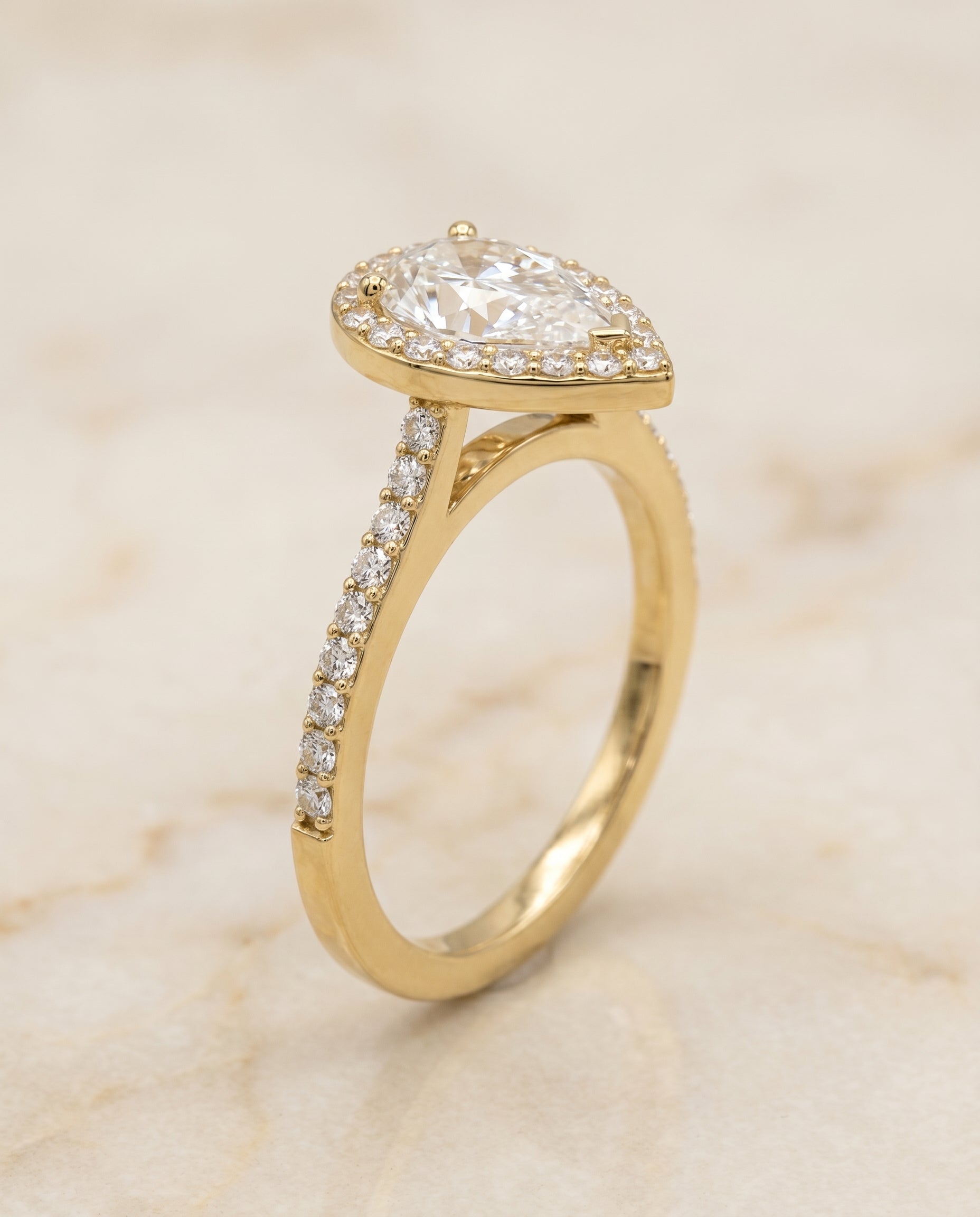 Pavé Halo styling on The Taylor pear engagement ring setting | RockHer