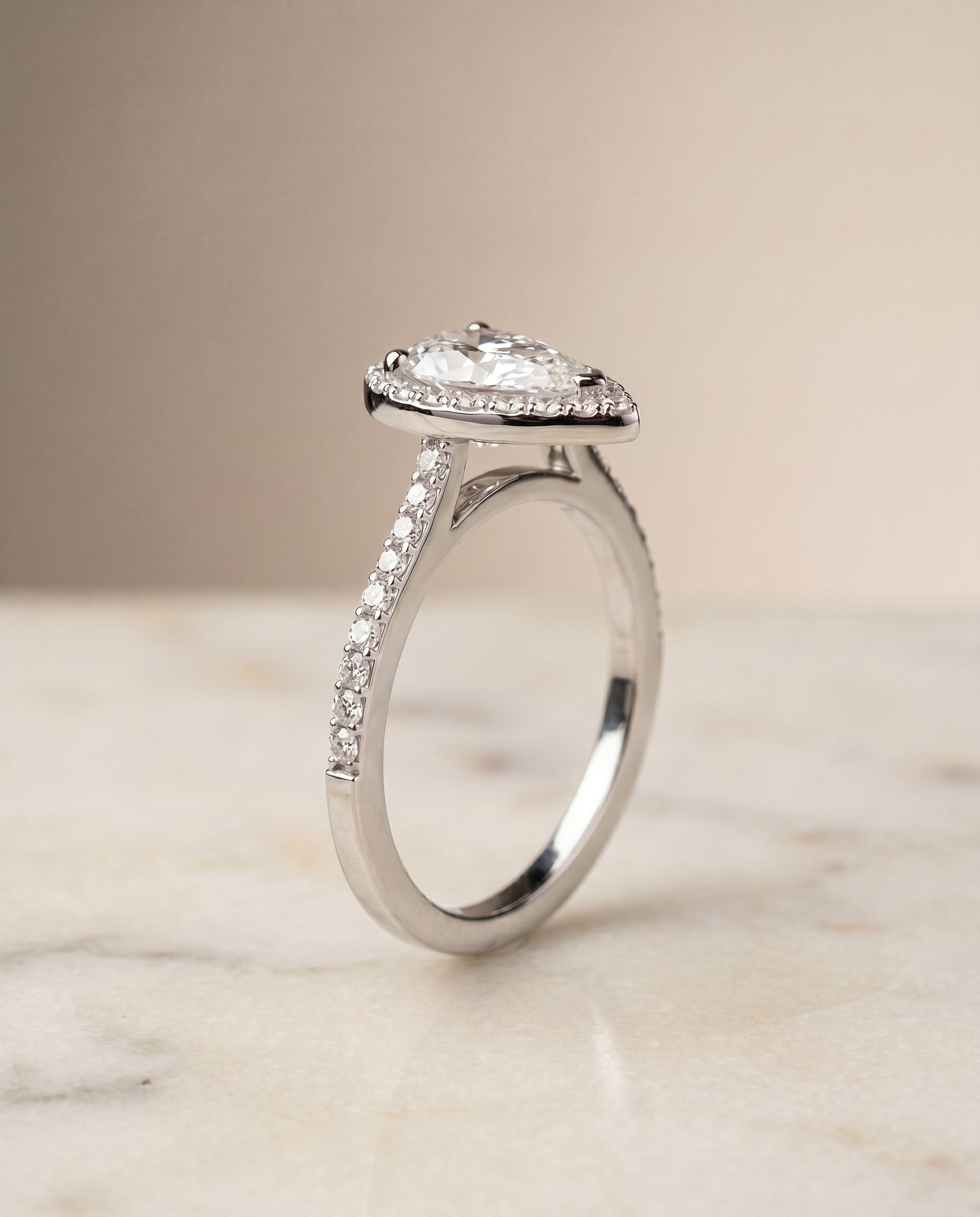 Pavé Halo styling on The Taylor pear engagement ring setting | RockHer