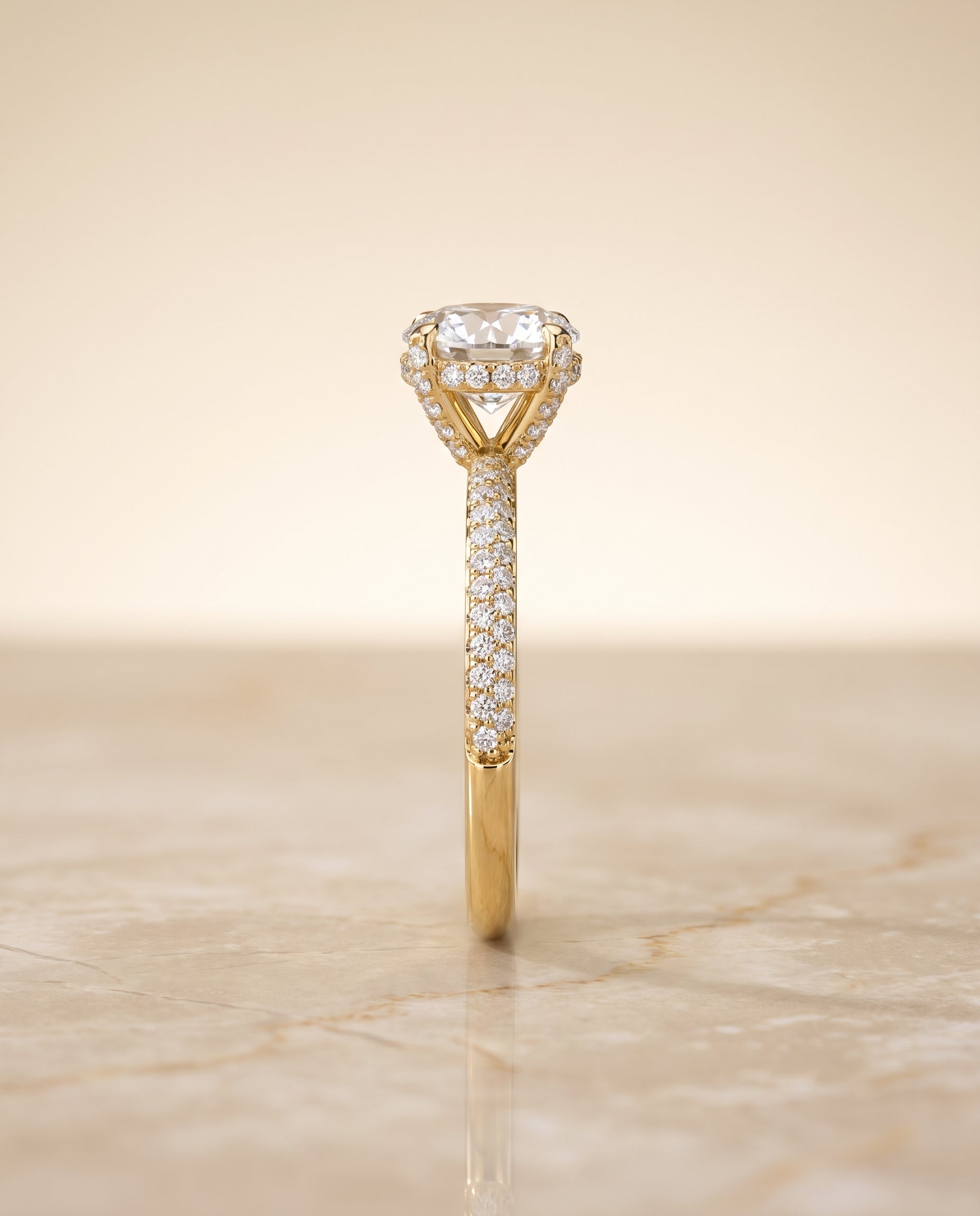 The Tina setting for round diamonds, made to order in 18K Yellow Gold | RockHer