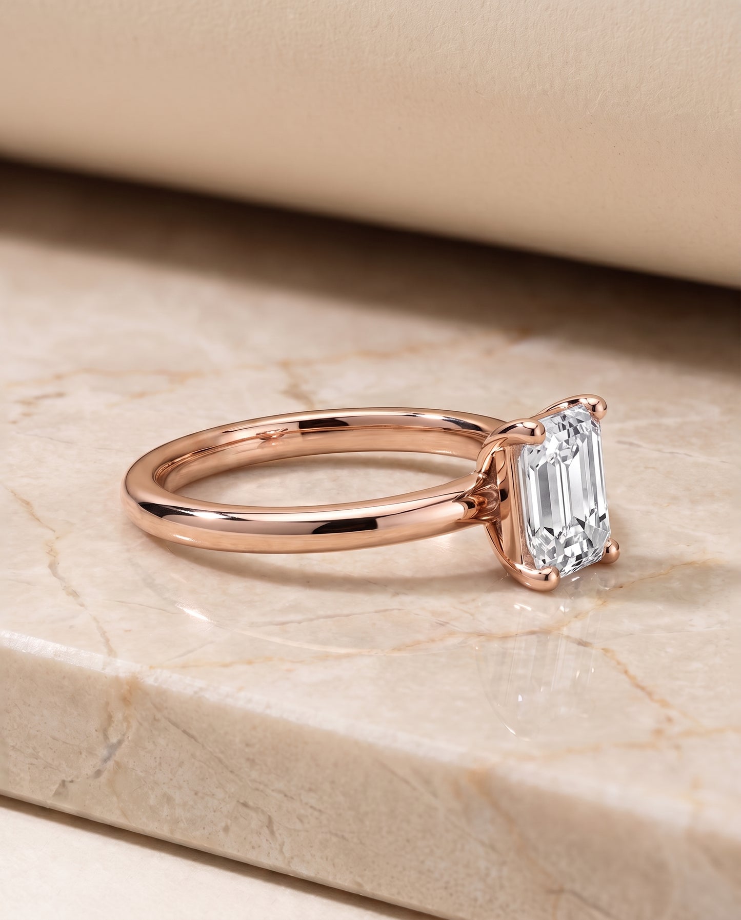 The Tori Rounded Comfort Fit Solitaire Emerald Cut Engagement Ring Setting in 14K Rose Gold