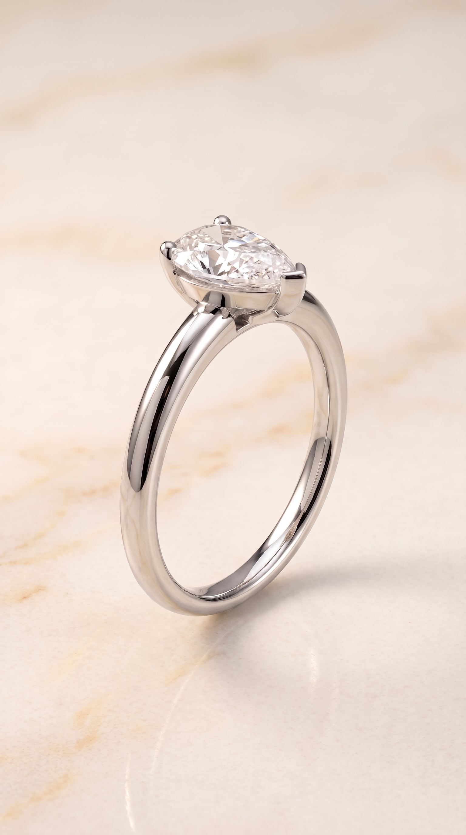 The Tori setting for pear diamonds, made to order in Platinum | RockHer