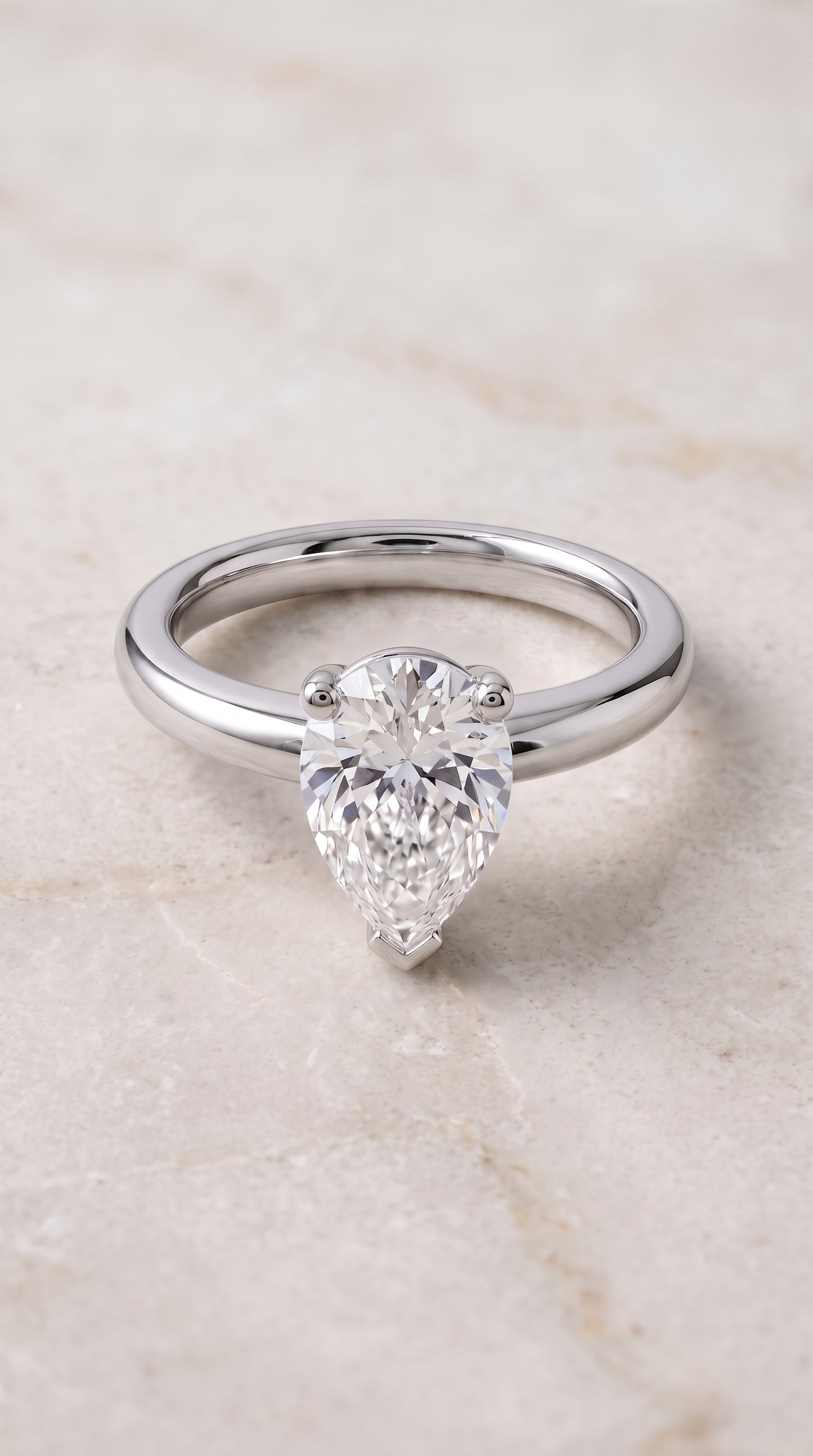 The Tori Rounded Comfort Fit Solitaire Pear Engagement Ring Setting in Platinum