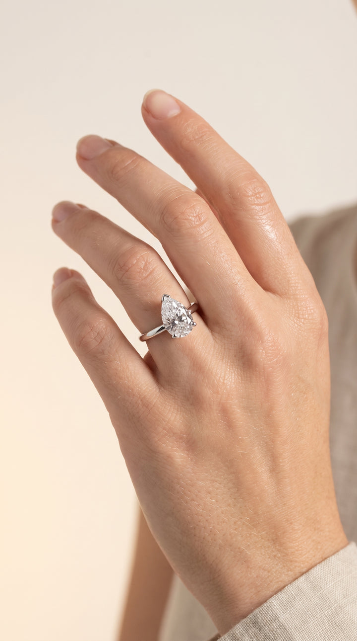 The Tori Rounded Comfort Fit Solitaire Pear Engagement Ring Setting in Platinum