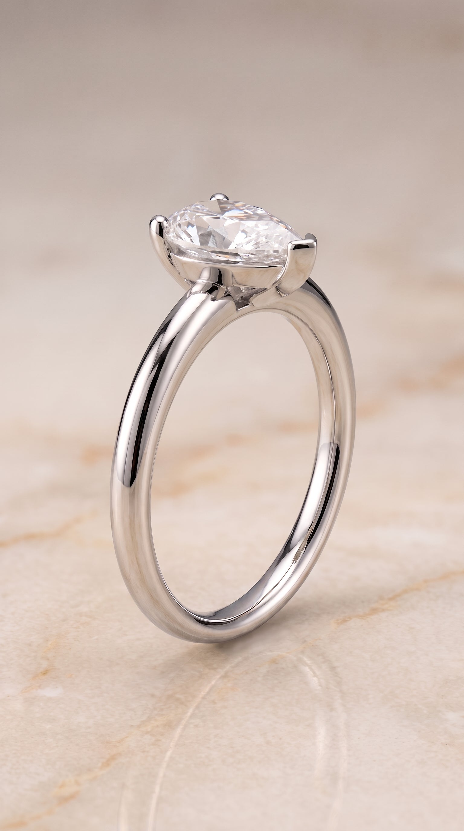 Rounded Comfort Fit Solitaire styling on The Tori pear engagement ring setting | RockHer