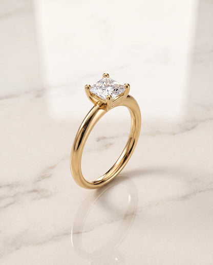 The Tori Rounded Comfort Fit Solitaire Princess Cut Engagement Ring Setting in 18K Yellow Gold