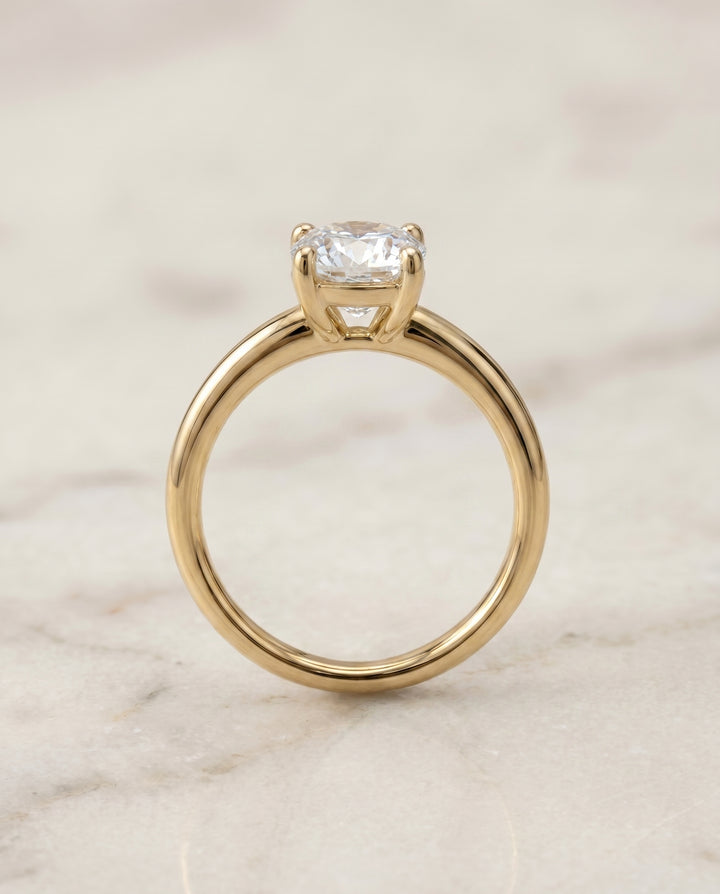 The Tori Solitaire Engagement Ring Setting for Cushion Diamonds in 18K Yellow Gold