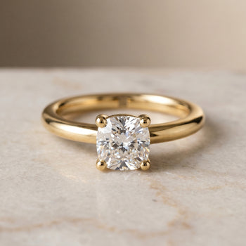 The Tori Rounded Comfort Fit Solitaire Cushion Cut Engagement Ring Setting in 18K Yellow Gold