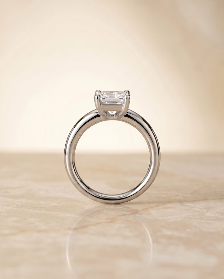 The Tori Rounded Comfort Fit Solitaire Emerald Cut Engagement Ring Setting in Platinum