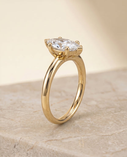 Tori Select Solitaire Marquise Lab Diamond Engagement Ring in 18K Yellow Gold, shown on hand, angled | RockHer