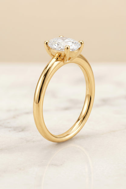 The Tori Select Rounded Comfort Fit Solitaire Oval Lab Diamond Engagement Ring in 18K Yellow Gold, front view | RockHer