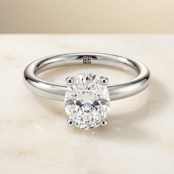 The Tori Rounded Comfort Fit Solitaire Oval Engagement Ring Setting in 18K White Gold