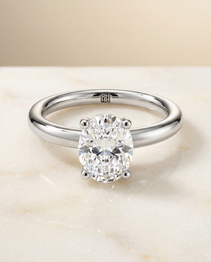 The Tori Rounded Comfort Fit Solitaire Oval Engagement Ring Setting in Platinum