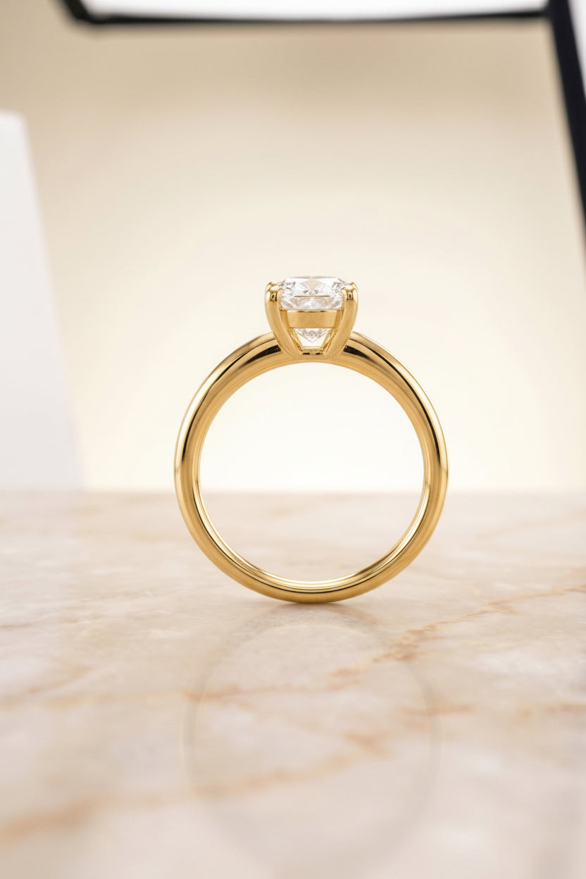 The Tori Select Rounded Comfort Fit Solitaire Oval Lab Diamond Engagement Ring in 18K Yellow Gold, side view | RockHer