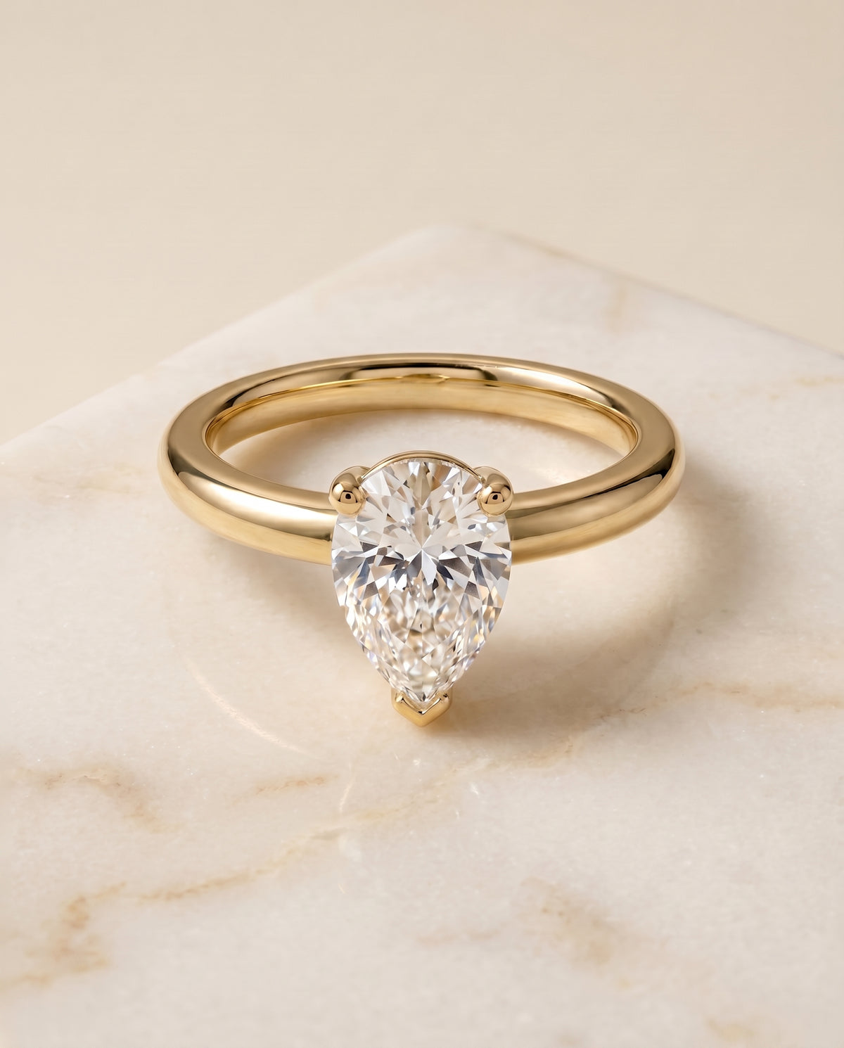 The Tori pear engagement ring setting in 18K Yellow Gold | RockHer