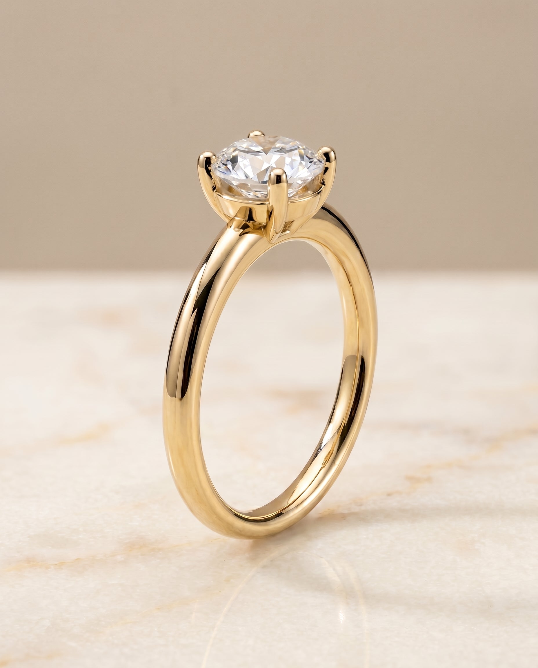 Rounded Comfort Fit Solitaire styling on The Tori round engagement ring setting | RockHer