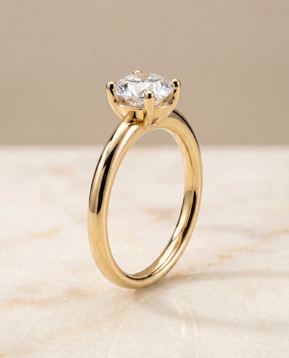 The Tori Rounded Comfort Fit Solitaire Round Engagement Ring Setting in 18K Yellow Gold