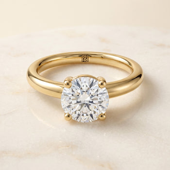 The Tori Rounded Comfort Fit Solitaire Round Engagement Ring Setting in 18K Yellow Gold
