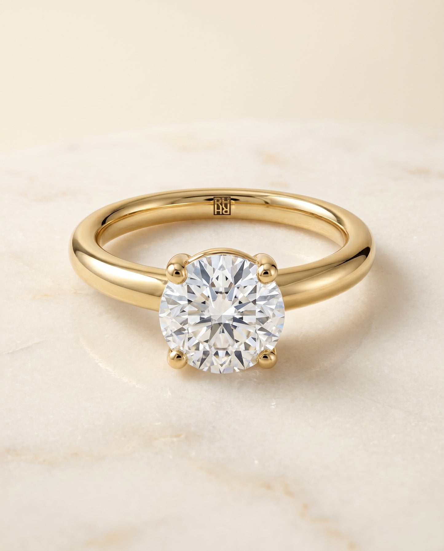 The Tori Solitaire Engagement Ring Setting for Round Diamonds in 18K Yellow Gold