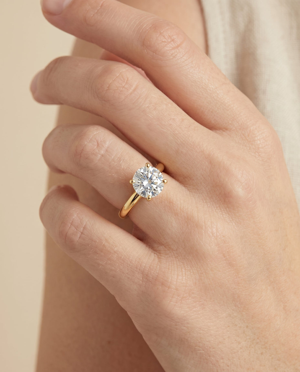 Tori Select Solitaire Round Lab Diamond Engagement Ring in 18K Yellow Gold, shown on hand | RockHer