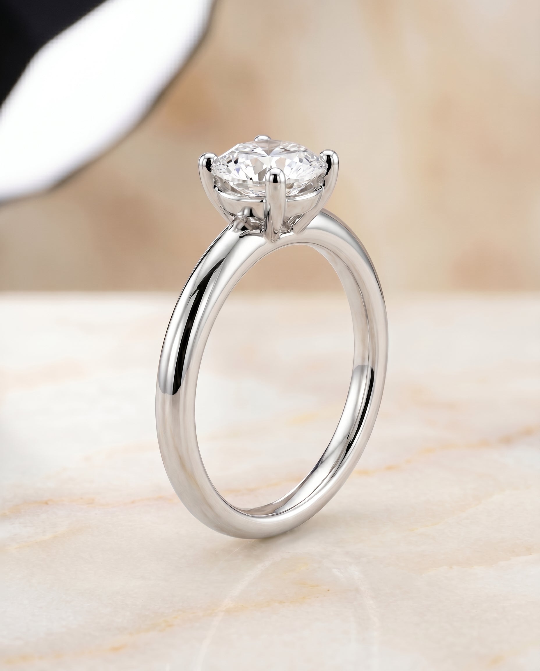 Rounded Comfort Fit Solitaire styling on The Tori round engagement ring setting | RockHer