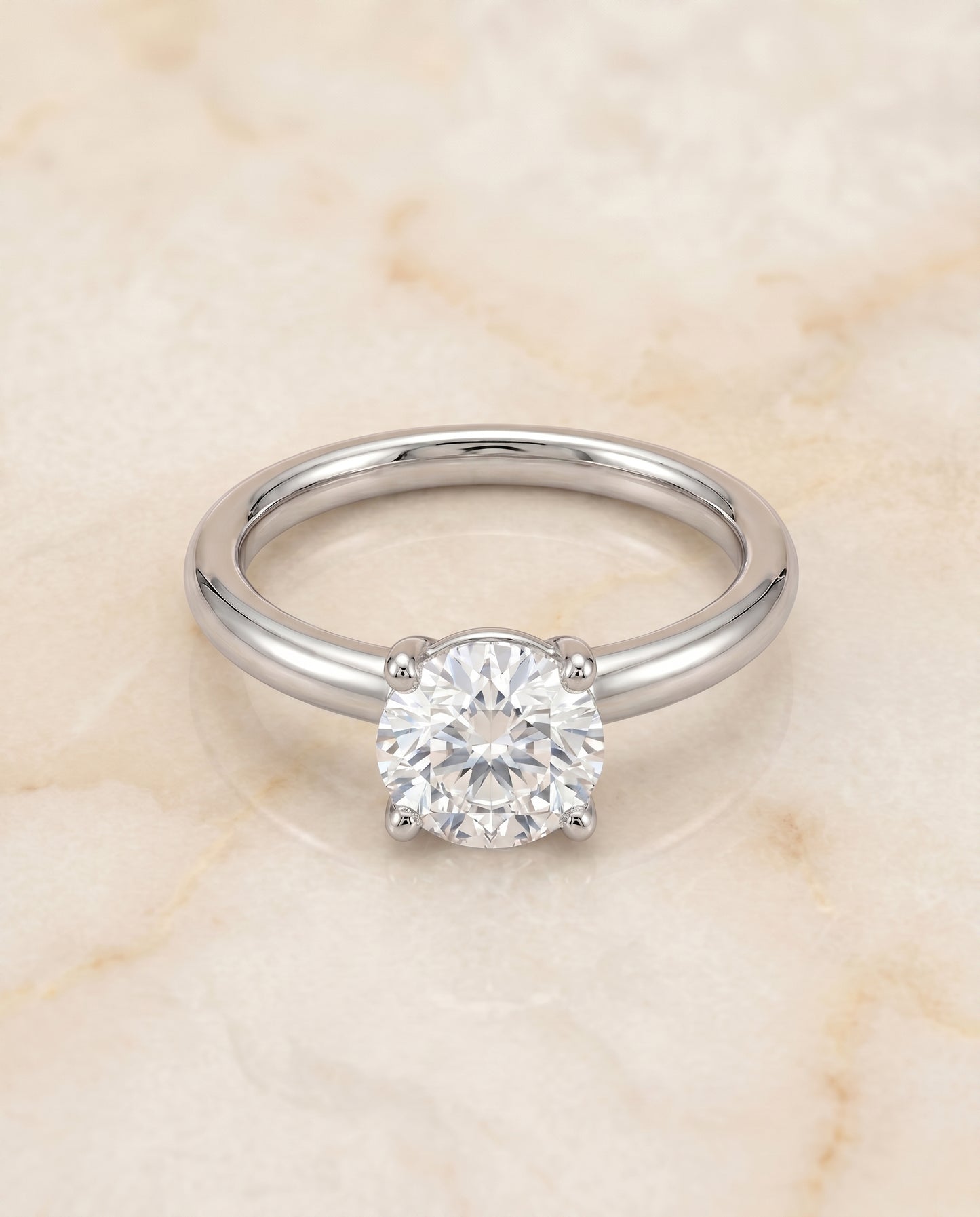 The Tori Solitaire Engagement Ring Setting for Round Diamonds in 18K White Gold