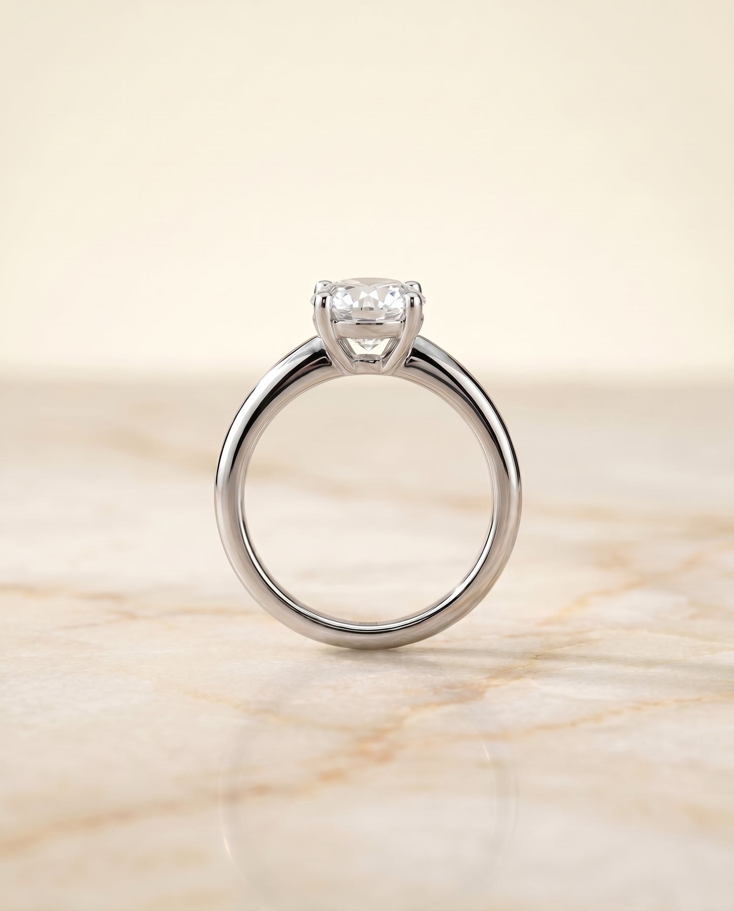 The Tori Solitaire Engagement Ring Setting for Round Diamonds in 18K White Gold