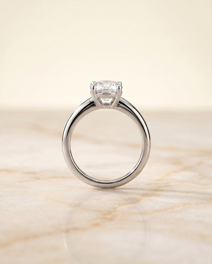 The Tori Solitaire Engagement Ring Setting for Round Diamonds in 18K White Gold