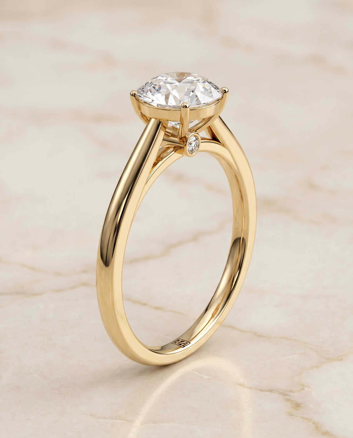 The Valerie Comfort Fit Secret Stone Solitaire Round Engagement Ring Setting in 18K Yellow Gold