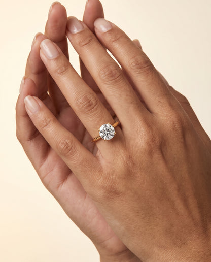 The Valerie Comfort Fit Secret Stone Solitaire Round Engagement Ring Setting in 18K Yellow Gold